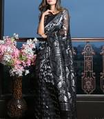 Black jamdani saree with all over silver zari work