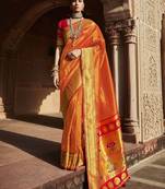 Orange woven pure silk saree with blouse