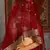 Red sequins embroidered net semi-stitched lehenga for wedding