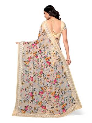 Beige printed georgette saree with blouse 4