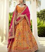 Orange embroidered art silk semi stitched lehenga