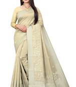Cream art silk woven saree with blouse