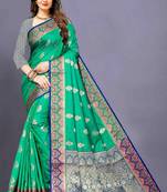 Green woven silk blend saree with blouse