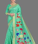 Green woven silk blend saree with blouse
