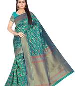 Sea green woven art silk saree with blouse