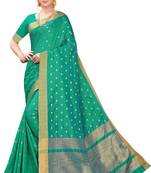 Green woven silk blend saree with blouse