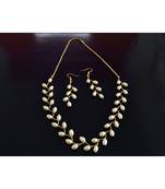 White pearl Brass   Necklace   pair of earrings & free gift