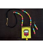 Yellow metallic Brass   Necklace   pair of earrings & free gift