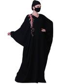 Black Kaftan With Pink Handwork And A Matching Hijab.