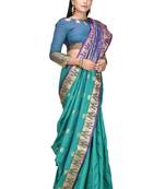 Green woven art silk saree with blouse