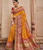 Orange embroidered banarasi silk saree with blouse