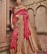 Pink embroidered banarasi silk saree with blouse
