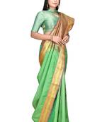 Green woven art silk saree with blouse