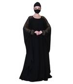 Beautiful Black Kaftan Abaya With Golden Stonework And A Matching Hijab.