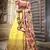 Yellow & Red zari, sequins and thread embroidered net semi stitched wedding lehenga