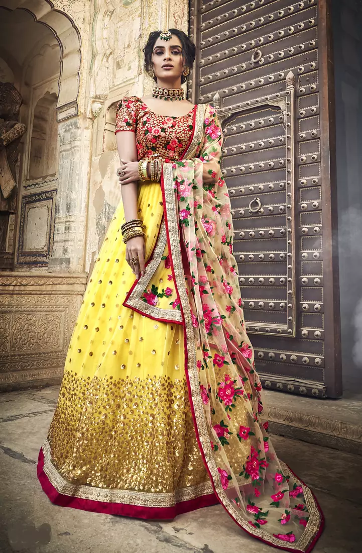 Yellow & Red zari, sequins and thread embroidered net semi stitched wedding lehenga