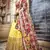 Yellow & Red zari, sequins and thread embroidered net semi stitched wedding lehenga