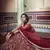 Red zari and thread embroidered net semi stitched wedding lehenga