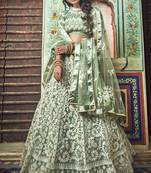 Sea Green Thread Embroidered Net Semi Stitched Bridal Lehenga