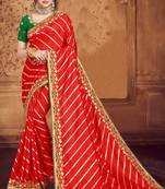 Red embroidered poly silk saree with blouse