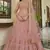 Peach embroidered net semi stitched bridal lehenga