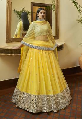 Yellow Gota and Zari embroidered with mirror work net Semi Stitched Bridal Lehenga 1