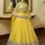 Yellow embroidered net semi stitched bridal lehenga