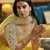 Yellow embroidered net semi stitched bridal lehenga