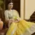 Yellow embroidered net semi stitched bridal lehenga