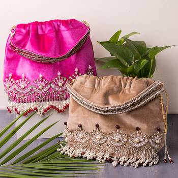 Designer Potli Bag with Zardozi work on Vibrant Pink Velvet 1