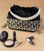 Sea Shell Design Potli Bag on a Royal Black Velvet