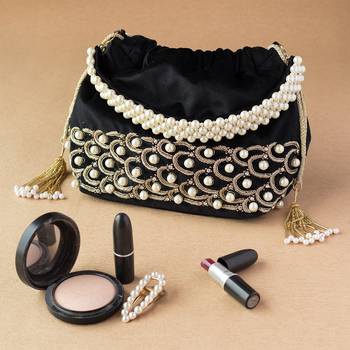 Sea Shell Design Potli Bag on a Royal Black Velvet 7