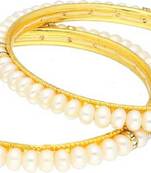 White pearl bangles-and-bracelets