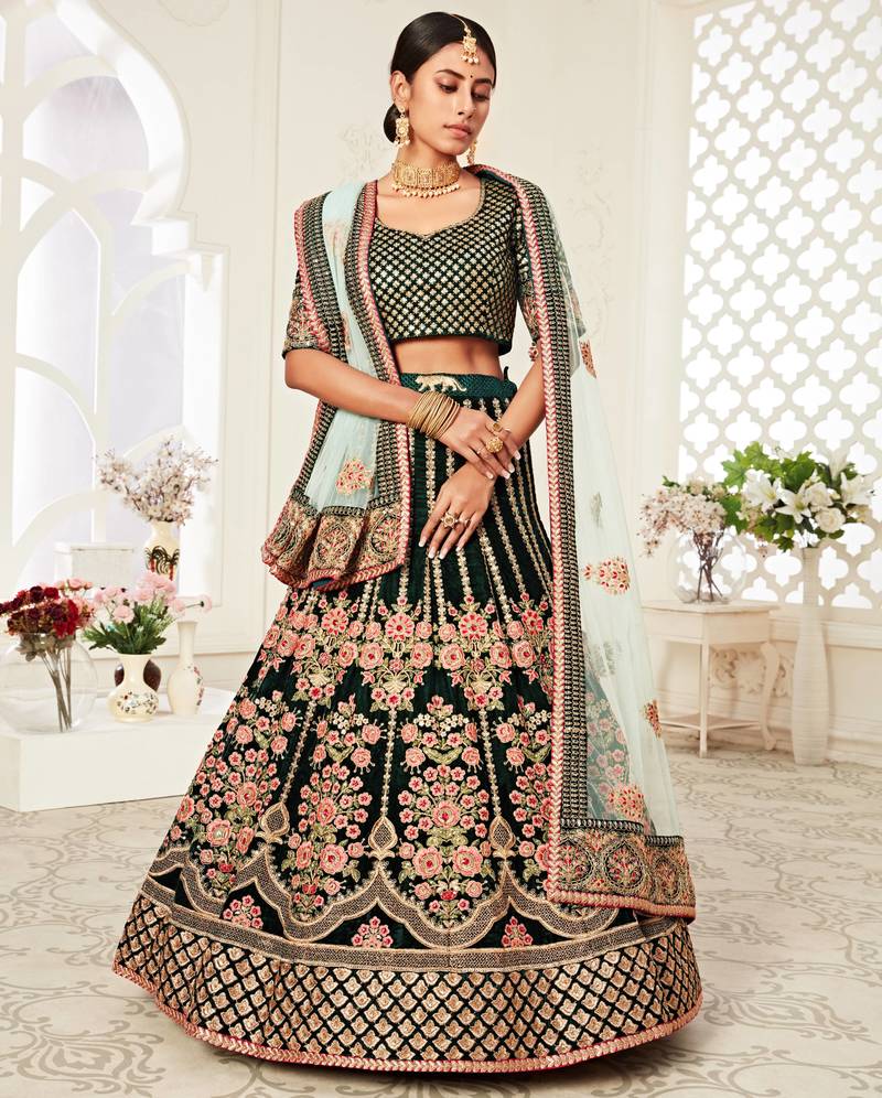 Exotic Dark Green Velvet Heavily Embroidered Wedding Bridal Lehenga Choli with Diamond Work