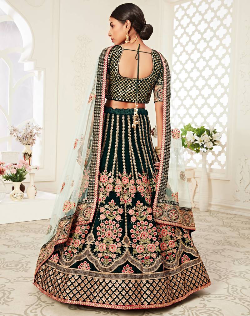 Exotic Dark Green Velvet Heavily Embroidered Wedding Bridal Lehenga Choli with Diamond Work