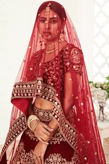 zari embroidered velvet dark red bridal lehenga set choli with dupattas