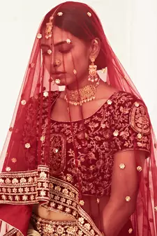 zari embroidered velvet dark red bridal lehenga set choli with dupattas