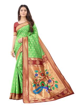 Green woven silk blend saree with blouse 1