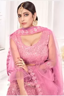 Pink embroidered net semi stitched lehenga