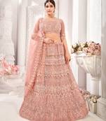Peach embroidered net semi stitched lehenga