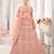 Peach embroidered net semi stitched lehenga