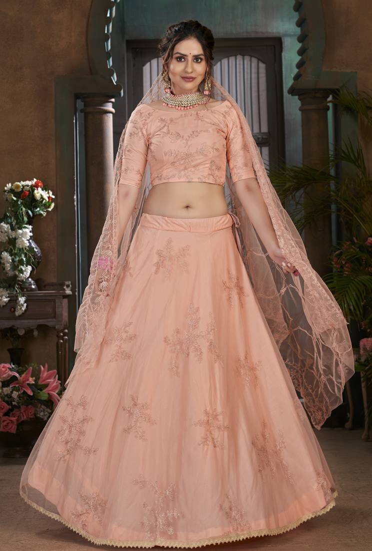 Peach Thread embroidered net semi stitched wedding lehenga