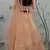 Peach Thread embroidered net semi stitched wedding lehenga