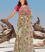Light green embroidered net saree with blouse