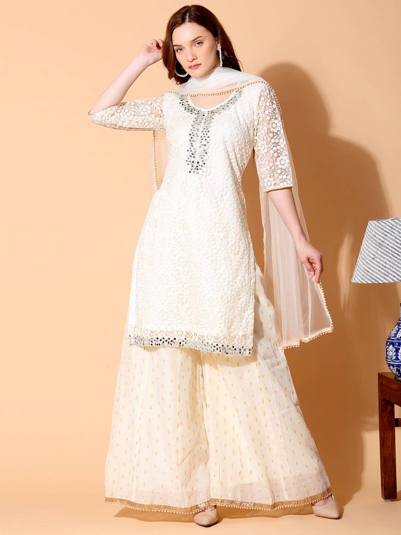 Cream embroidered net salwar