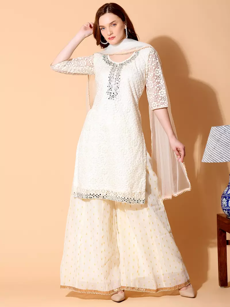 Cream embroidered net salwar