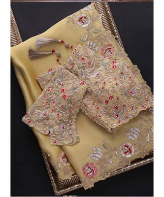 cream organza embroidered  saree with blouse 1