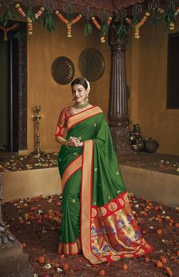 Green woven silk saree with blouse 1