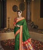 Green woven silk saree with blouse