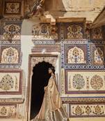 Beige woven banarasi silk saree with blouse